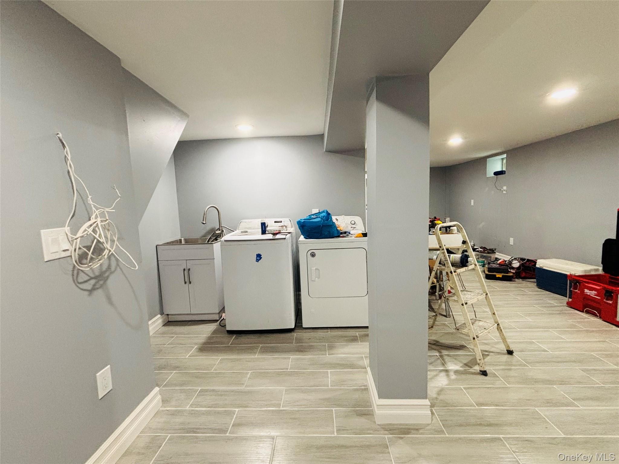 104-39 210th Street Queens, NY 11429 - Photo 13 of 18 a view of a room with gym equipment