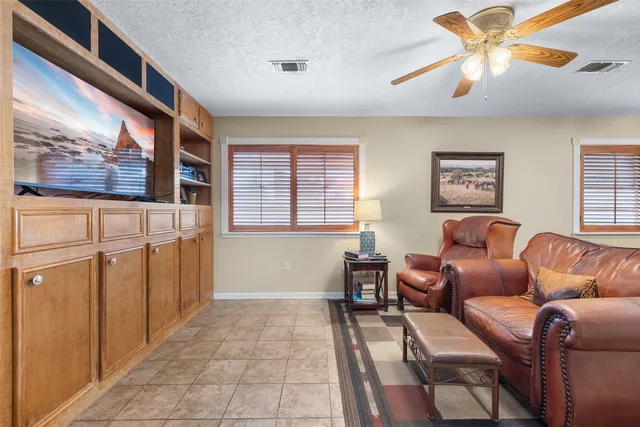 a workspace with furniture and window