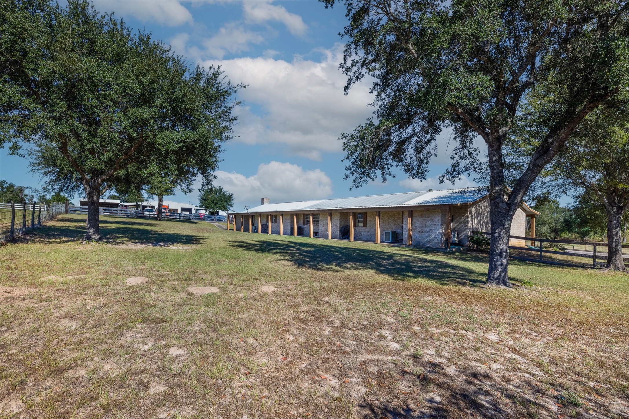 1611 Koy Road Bellville, TX 77418 - Photo 29 of 44 a view of a house with a yard