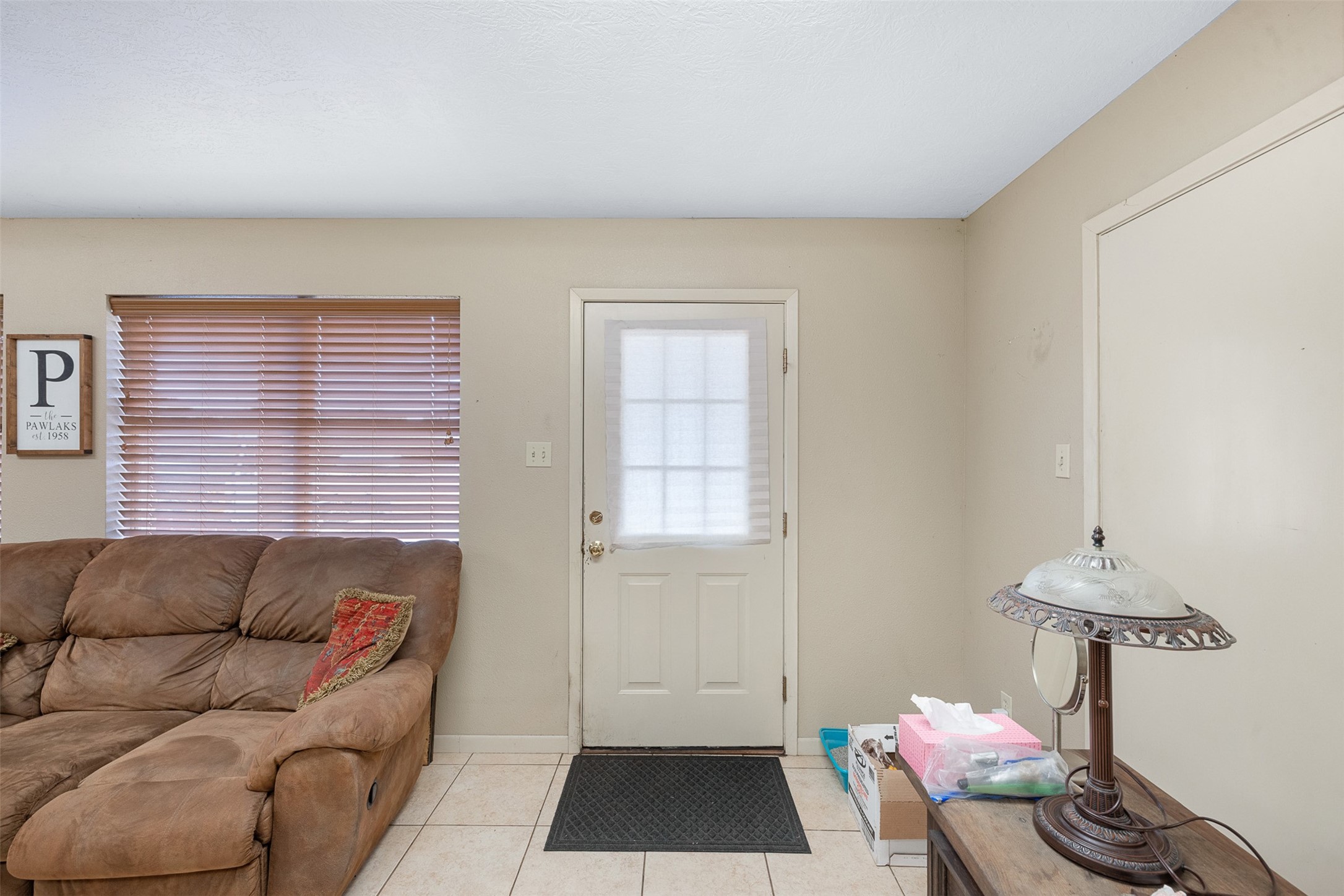 1611 Koy Road Bellville, TX 77418 - Photo 34 of 44 a living room with furniture and a window