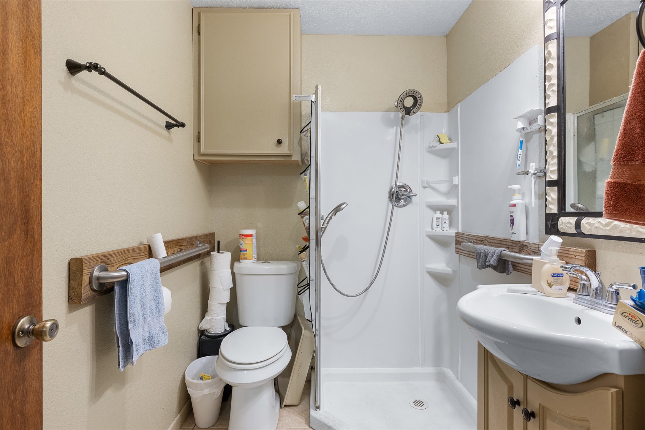1611 Koy Road Bellville, TX 77418 - Photo 37 of 44 a bathroom with a sink toilet and a mirror