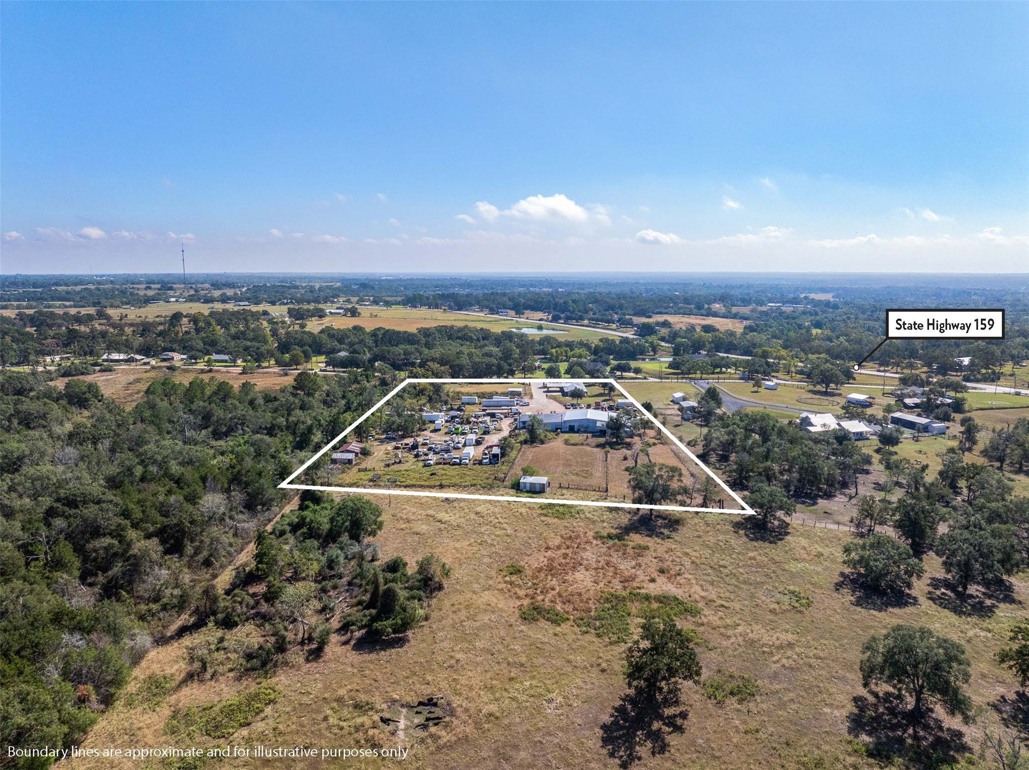1611 Koy Road Bellville, TX 77418 - Photo 41 of 44 an aerial view of a house with a garden