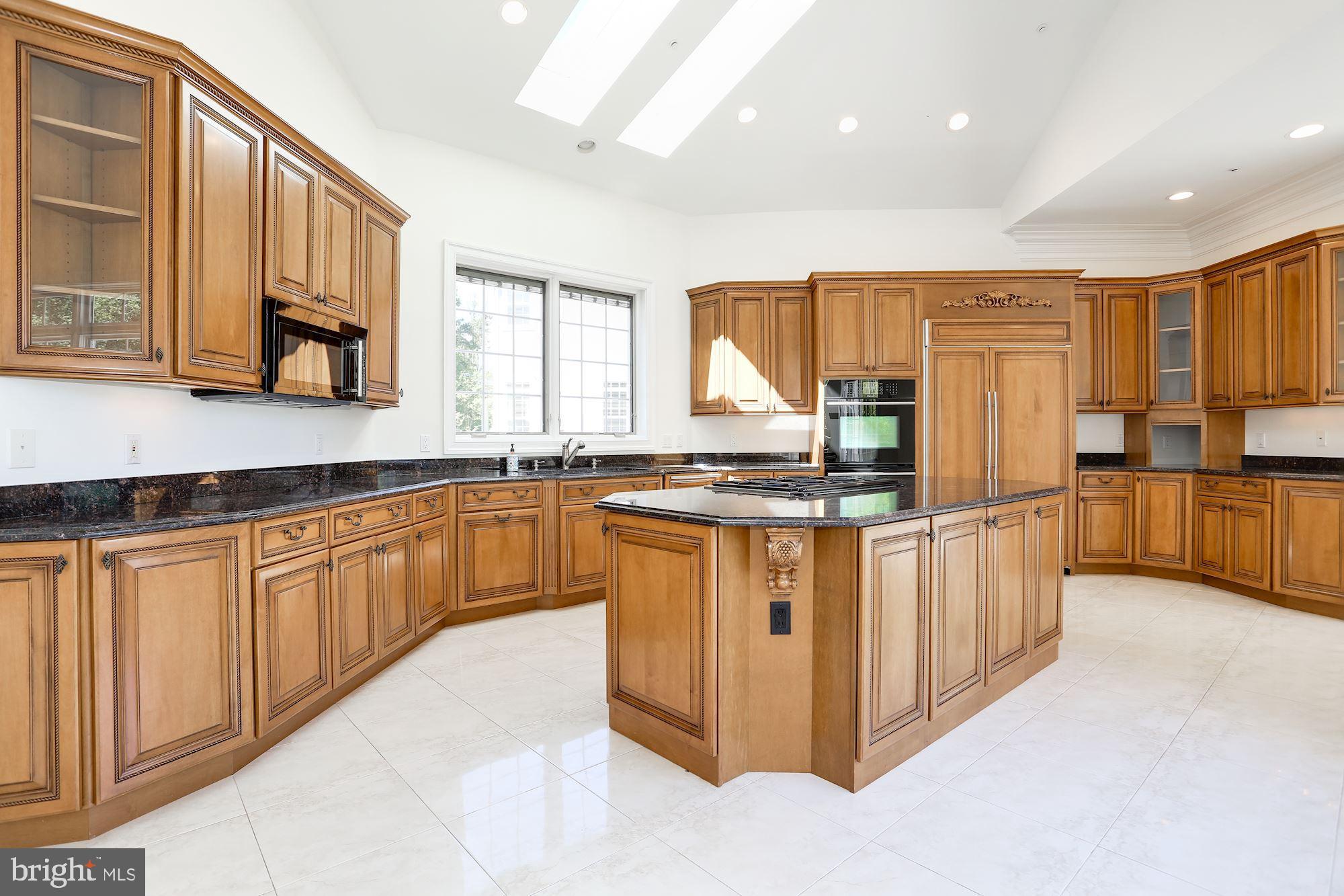 8705 Falls Road Potomac, MD 20854 - Photo 20 of 67 Gourmet kitchen with island