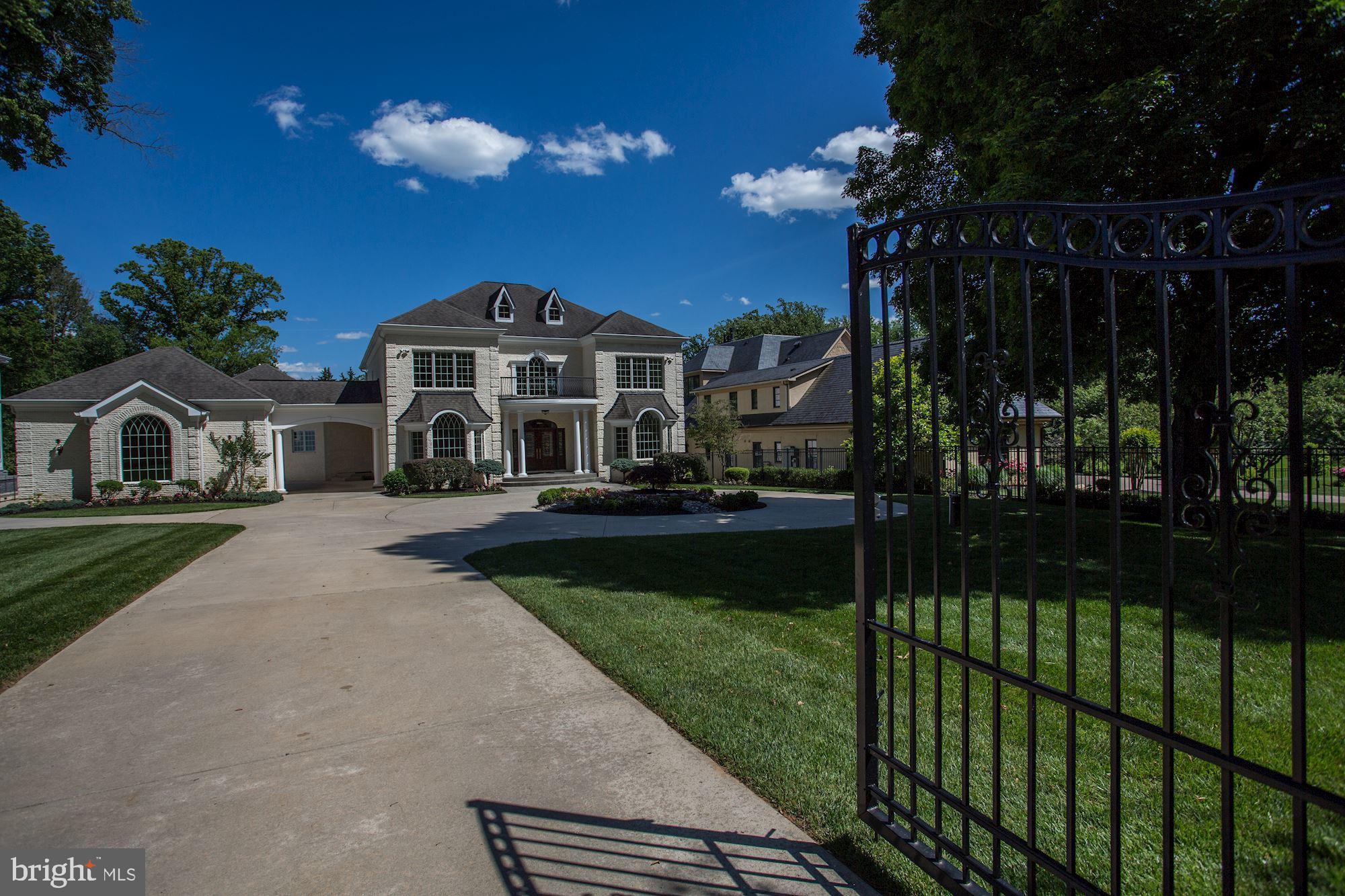8705 Falls Road Potomac, MD 20854 - Photo 3 of 67 Gate and driveway to circular drive