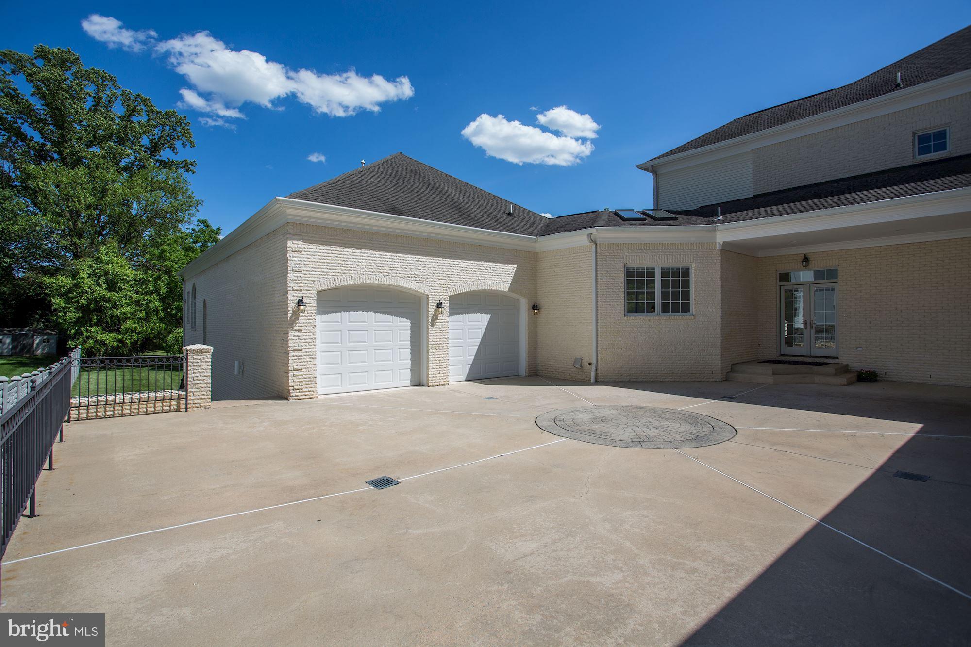 8705 Falls Road Potomac, MD 20854 - Photo 55 of 67 Two-car attached garage