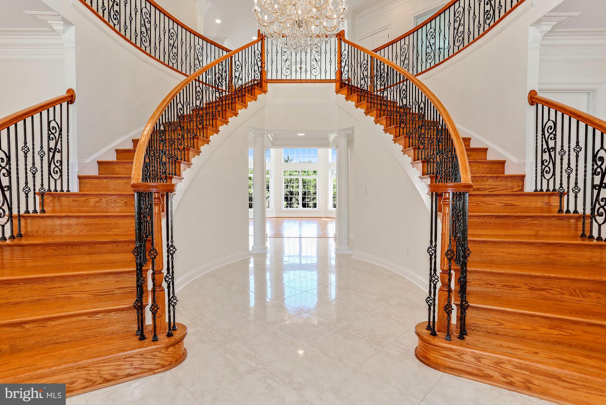 8705 Falls Road Potomac, MD 20854 - Photo 8 of 67 Elegant two-story foyer with circular stairs
