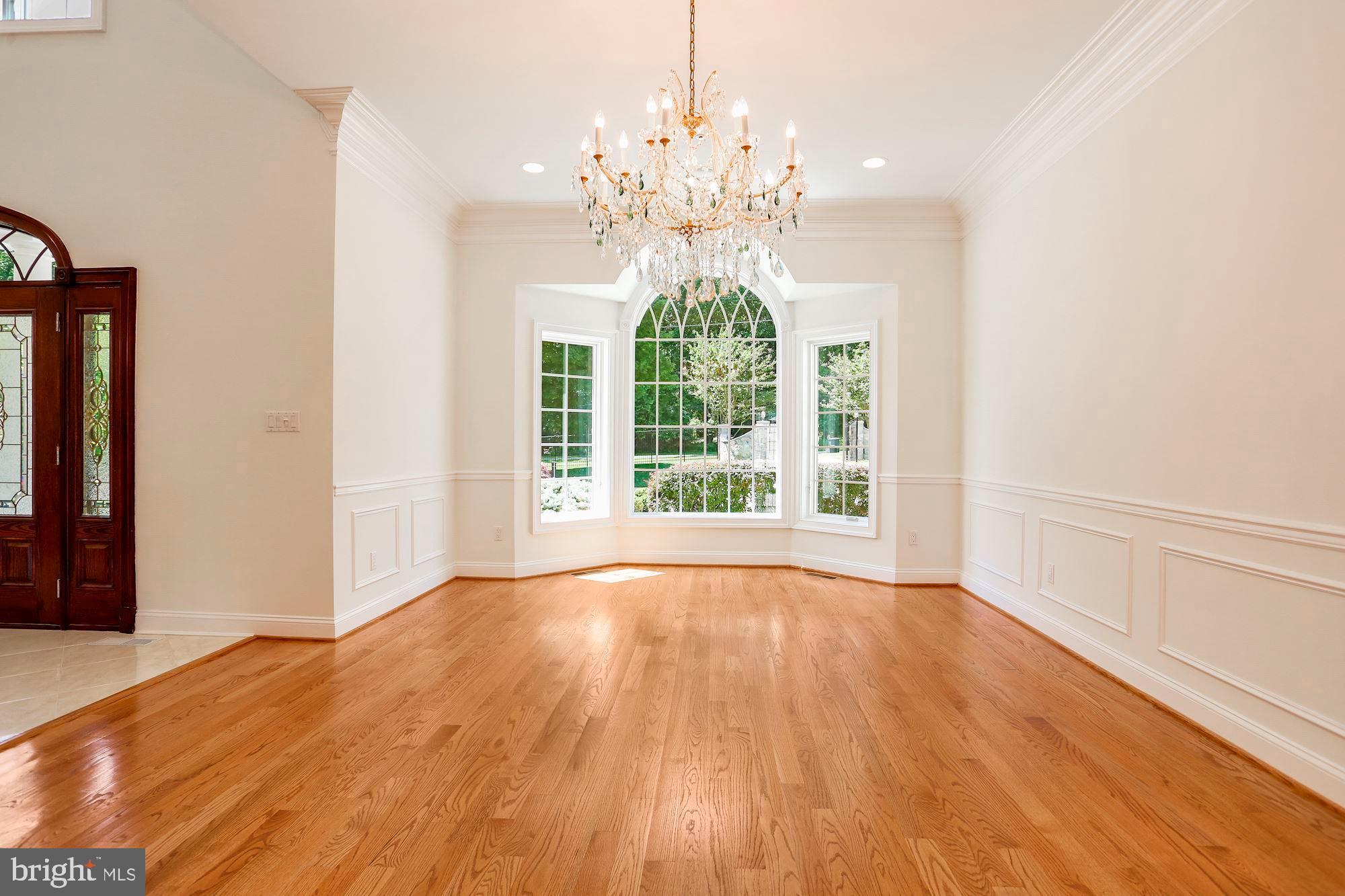 8705 Falls Road Potomac, MD 20854 - Photo 9 of 67 Dining room with custom molding and chair rail