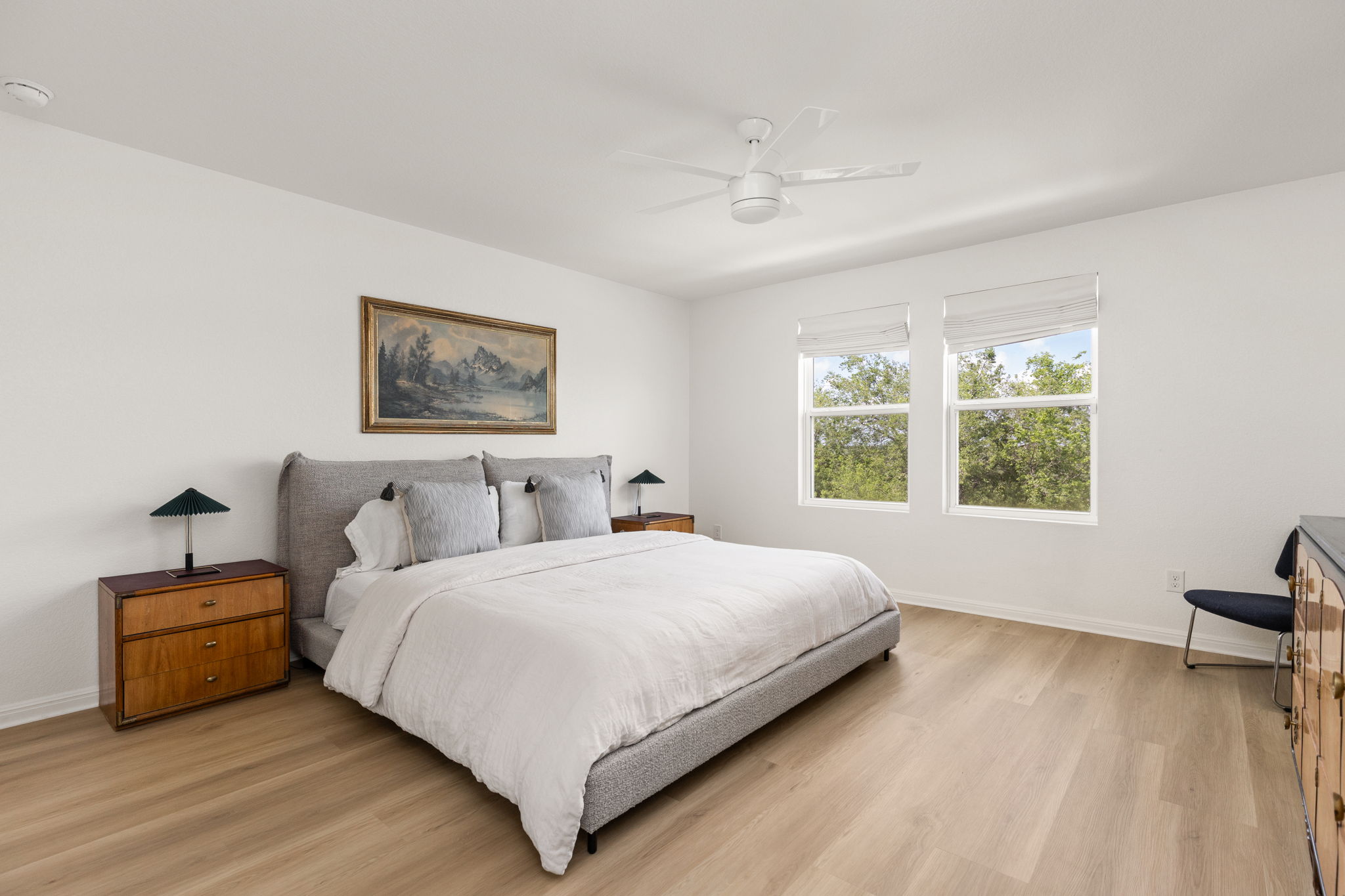 6702 Routenburn Street Austin, TX 78754 - Photo 12 of 24 a bedroom with a bed and a large window