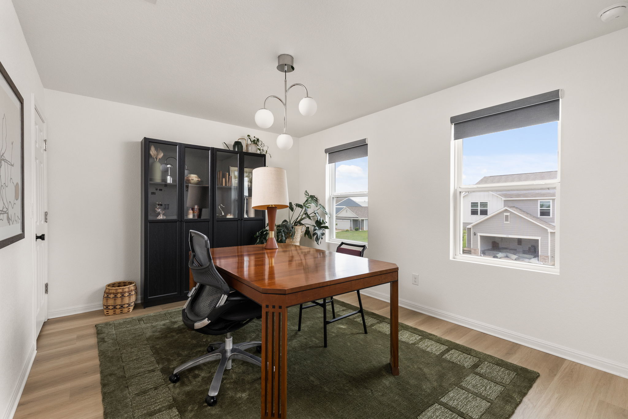 6702 Routenburn Street Austin, TX 78754 - Photo 15 of 24 a view of a a dining room with furniture window and wooden floor