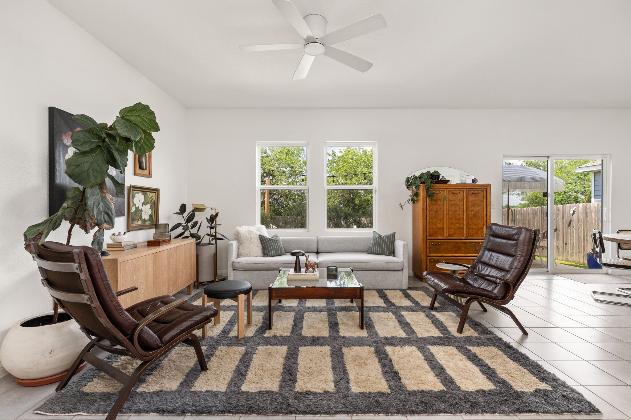 6702 Routenburn Street Austin, TX 78754 - Photo 3 of 24 a living room with furniture and a table