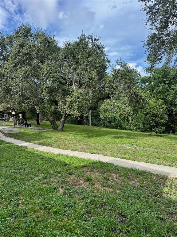 640 Northwest 13th Street, Unit 26 Boca Raton, FL 33486 - Photo 11 of 11 a view of a golf course with a garden