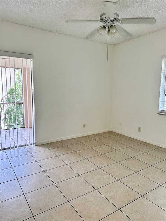640 Northwest 13th Street, Unit 26 Boca Raton, FL 33486 - Photo 5 of 11 a view of a room and window