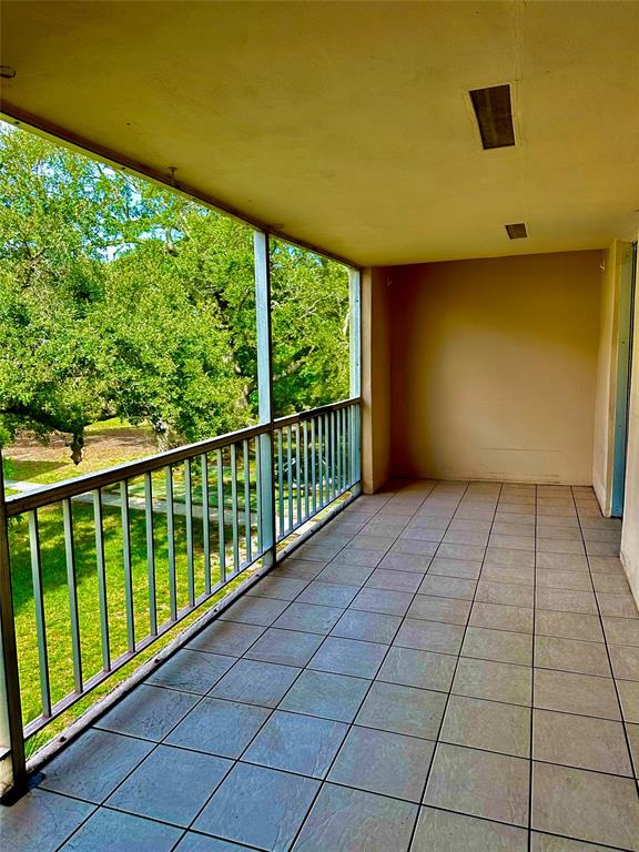 640 Northwest 13th Street, Unit 26 Boca Raton, FL 33486 - Photo 10 of 11 a view of a room with a large window
