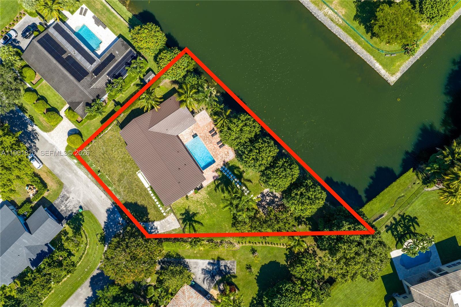 10945 Southwest 75th Court Pinecrest, FL 33156 - Photo 2 of 81 an aerial view of a house