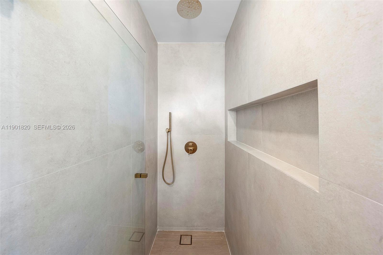 10945 Southwest 75th Court Pinecrest, FL 33156 - Photo 34 of 81 a bathroom with a shower