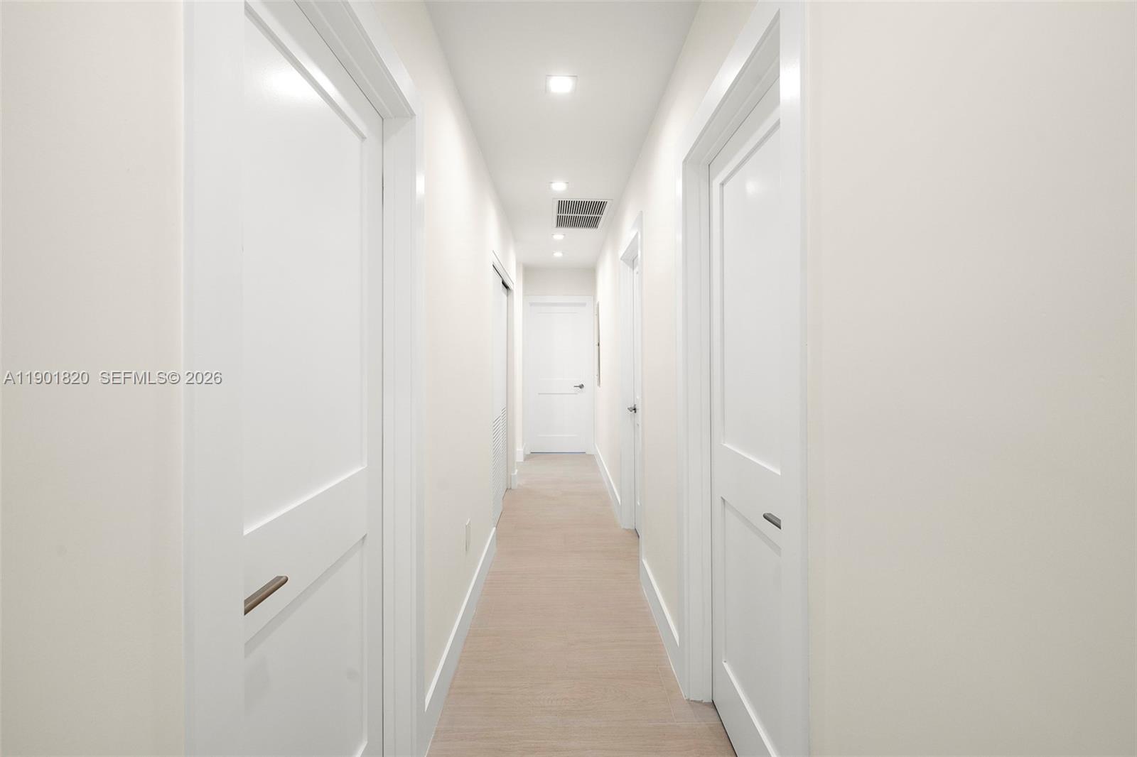 10945 Southwest 75th Court Pinecrest, FL 33156 - Photo 40 of 81 a view of a hallway