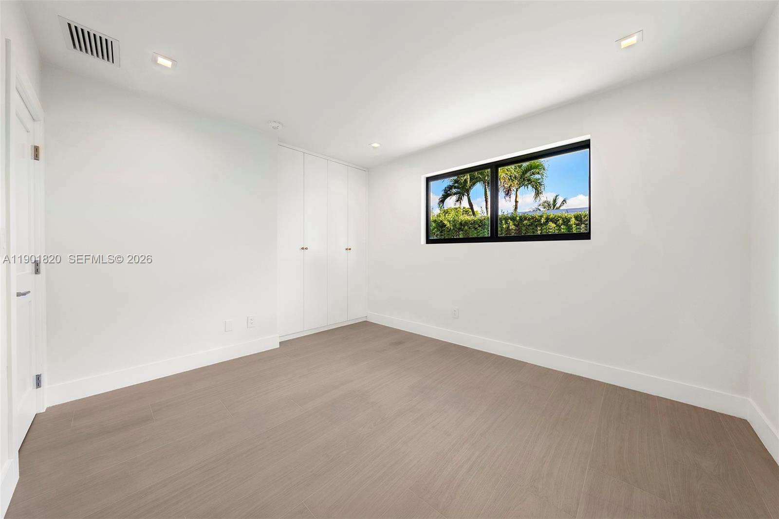 10945 Southwest 75th Court Pinecrest, FL 33156 - Photo 47 of 81 Fourth Bedroom with custom made closets.