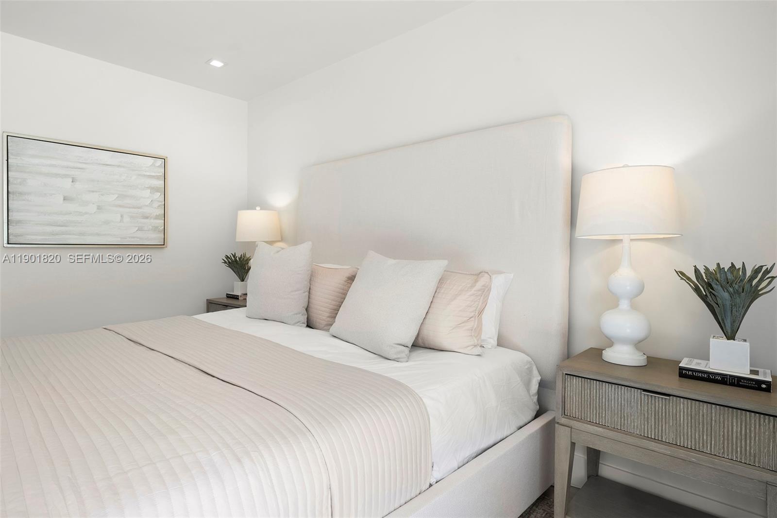 10945 Southwest 75th Court Pinecrest, FL 33156 - Photo 57 of 81 a bedroom with a bed and window