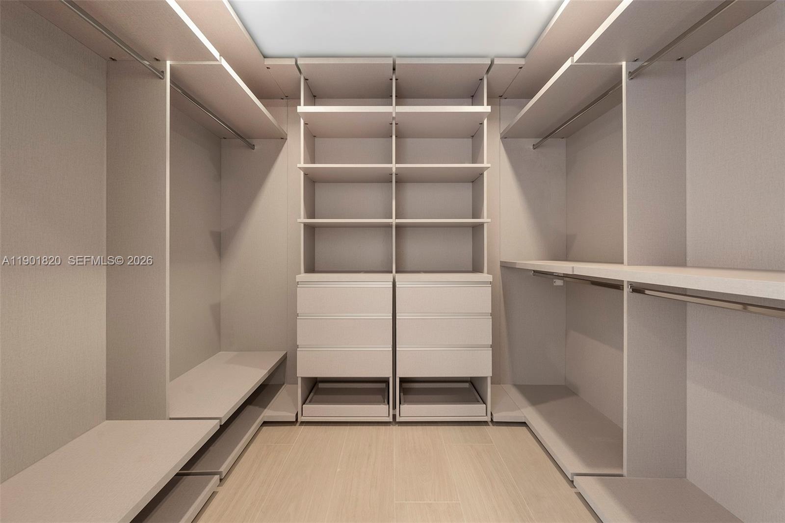 10945 Southwest 75th Court Pinecrest, FL 33156 - Photo 60 of 81 a room with walk in closet