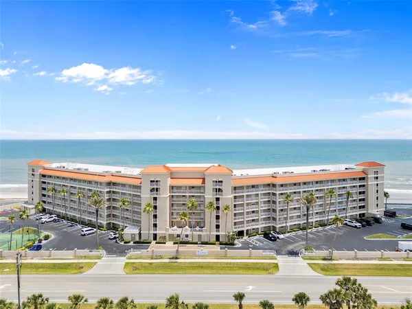 a view of building with ocean view