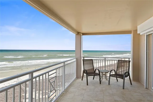 a kitchen with a table and chairs in it