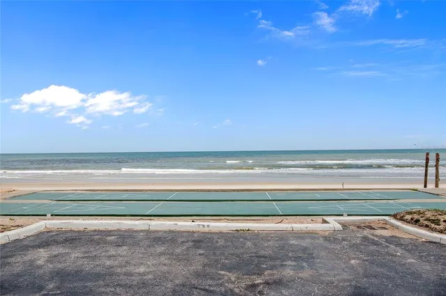 front view of a building with a swimming pool