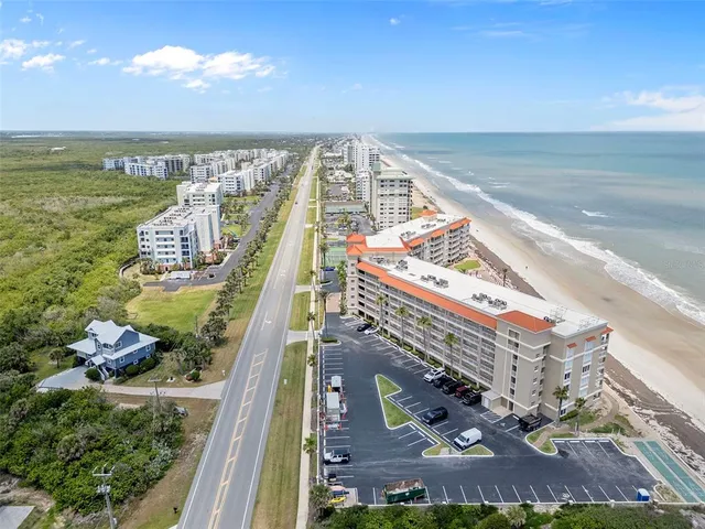 a view of a city with ocean