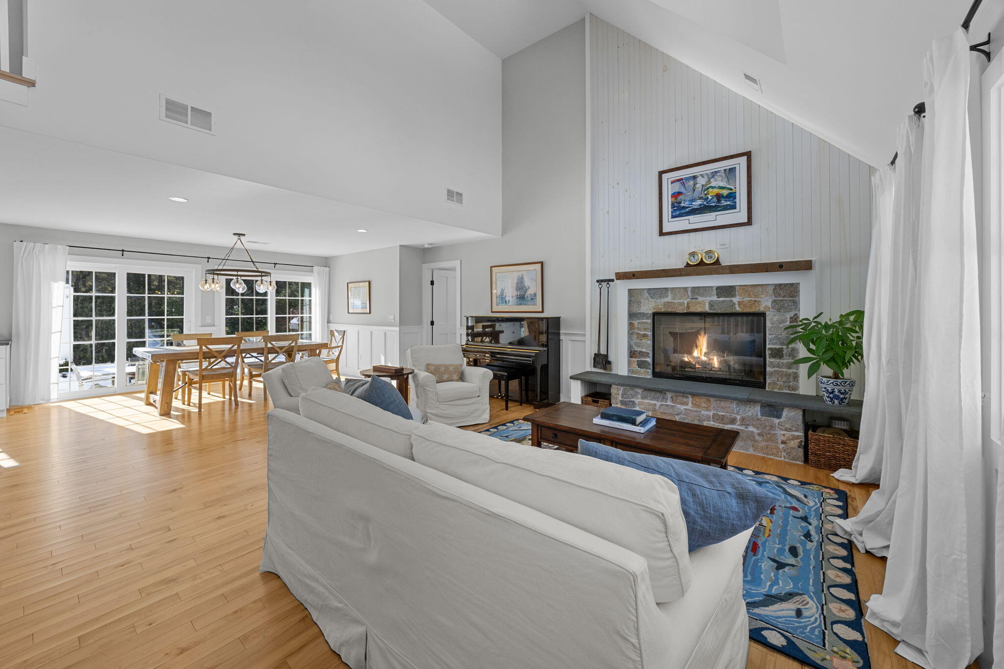 174 Cross Neck Road Marion, MA 02738 - Photo 17 of 41 a living room with furniture and a fireplace