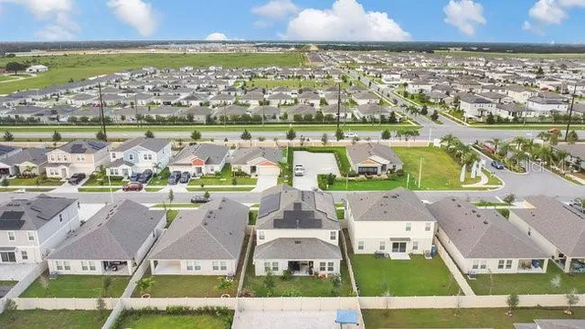 an aerial view of residential building with outdoor space