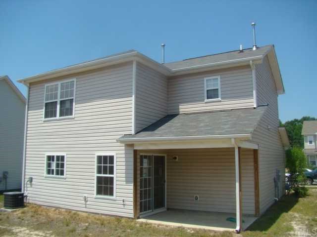 2627 Quarry Springs Road Raleigh, NC 27610 - Photo 2 of 9 a view of a house with garage
