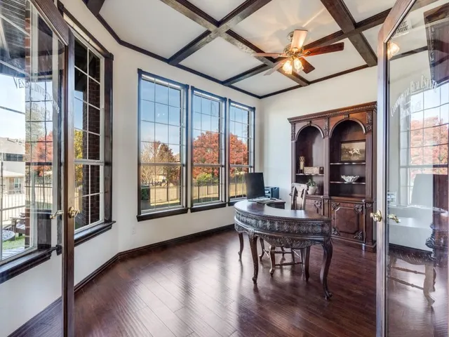 a view of a livingroom with furniture window and wooden floor