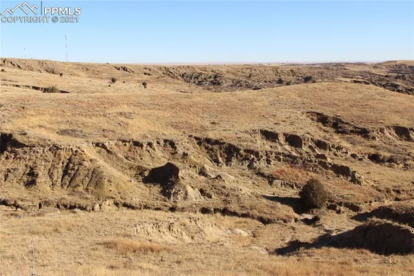 an aerial view of beach and ocean