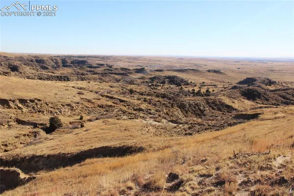 a view of ocean and mountain