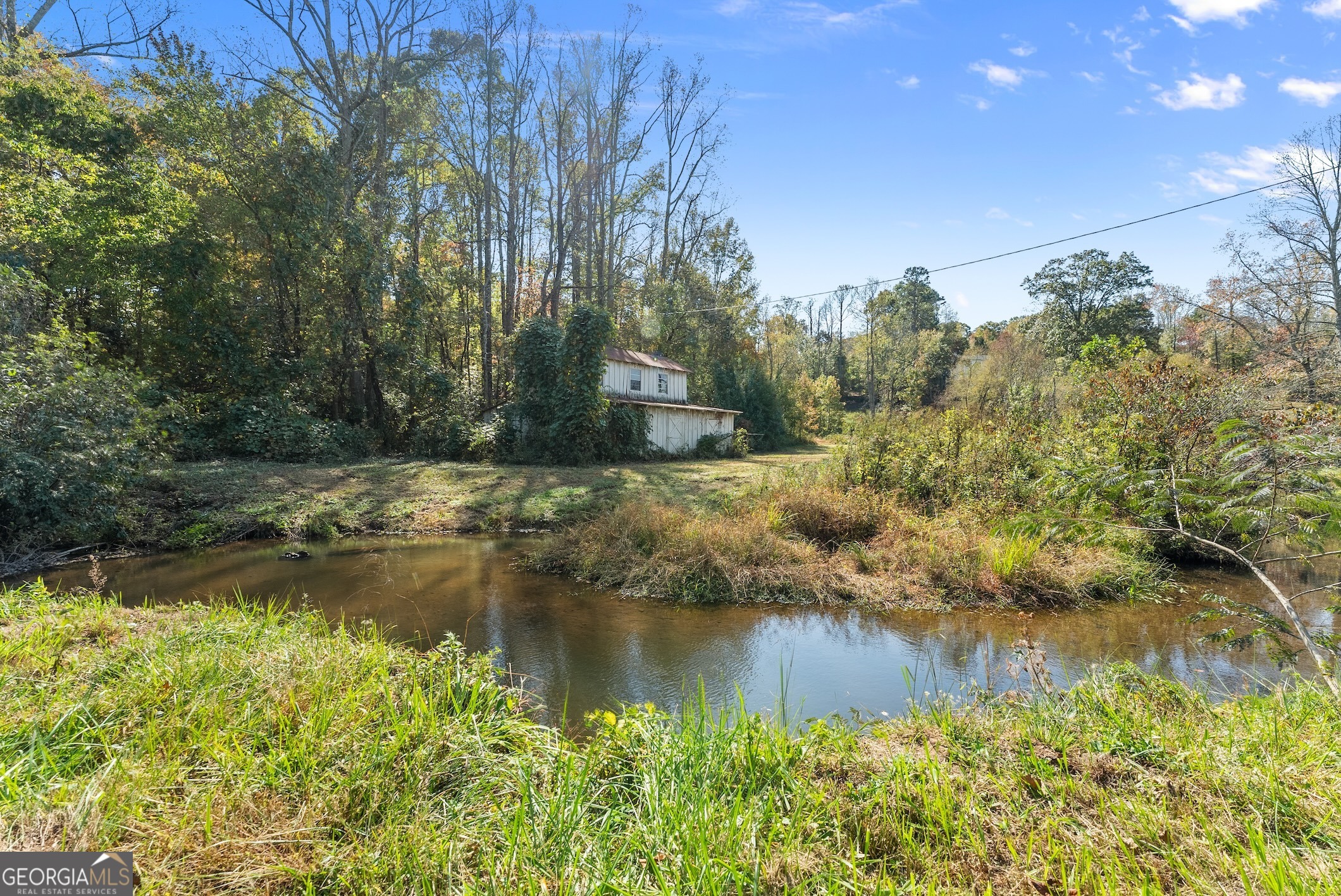 0 Highway 255 South Cleveland, GA 30528 - Photo 15 of 20 a view of a lake view with houses in back