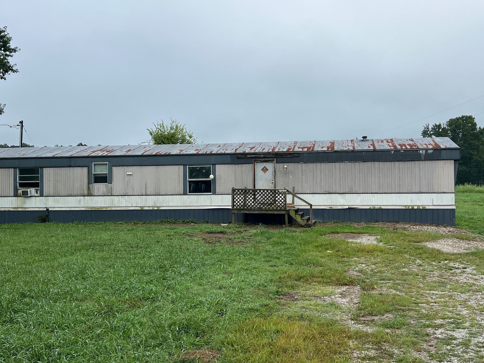 836 Spur Road Decherd, TN 37324 - Photo 3 of 5 a view of a terrace with a lake view