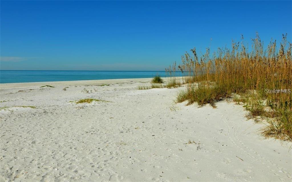 11000 Placida Road, Unit 101 Placida, FL 33946 - Photo 21 of 22 a view of beach and ocean