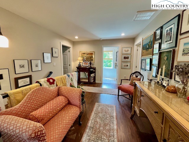 366 Russelton Road Boone, NC 28607 - Photo 15 of 29 a living room with furniture a rug and kitchen view