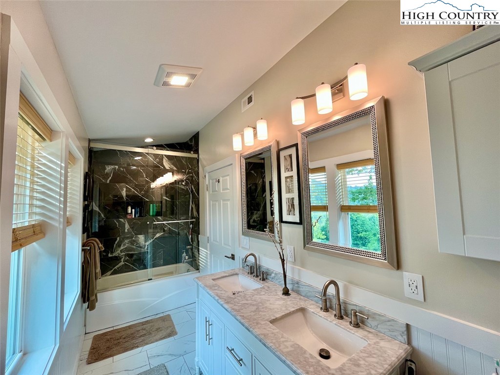 366 Russelton Road Boone, NC 28607 - Photo 19 of 29 a bathroom with a sink and a mirror