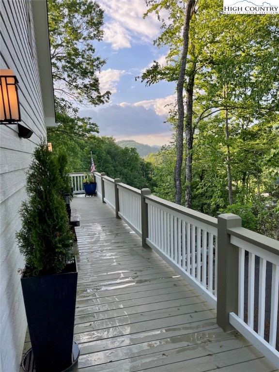366 Russelton Road Boone, NC 28607 - Photo 22 of 29 a view of a balcony with wooden floor and fence