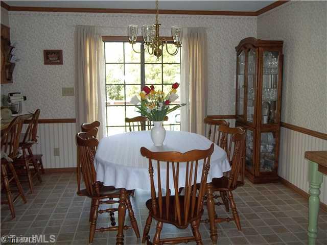 3607 Fieldview Road Pleasant Garden, NC 27313 - Photo 6 of 13 Dining Room. Bar seating adds additional dining and opens onto deck. Great for large family and entertaining