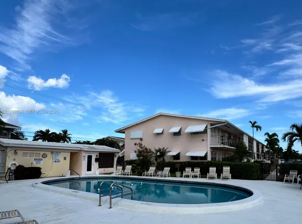 a front view of house with yard and seating