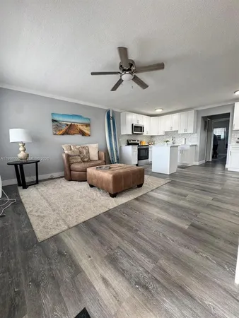 a bedroom with furniture and a chandelier