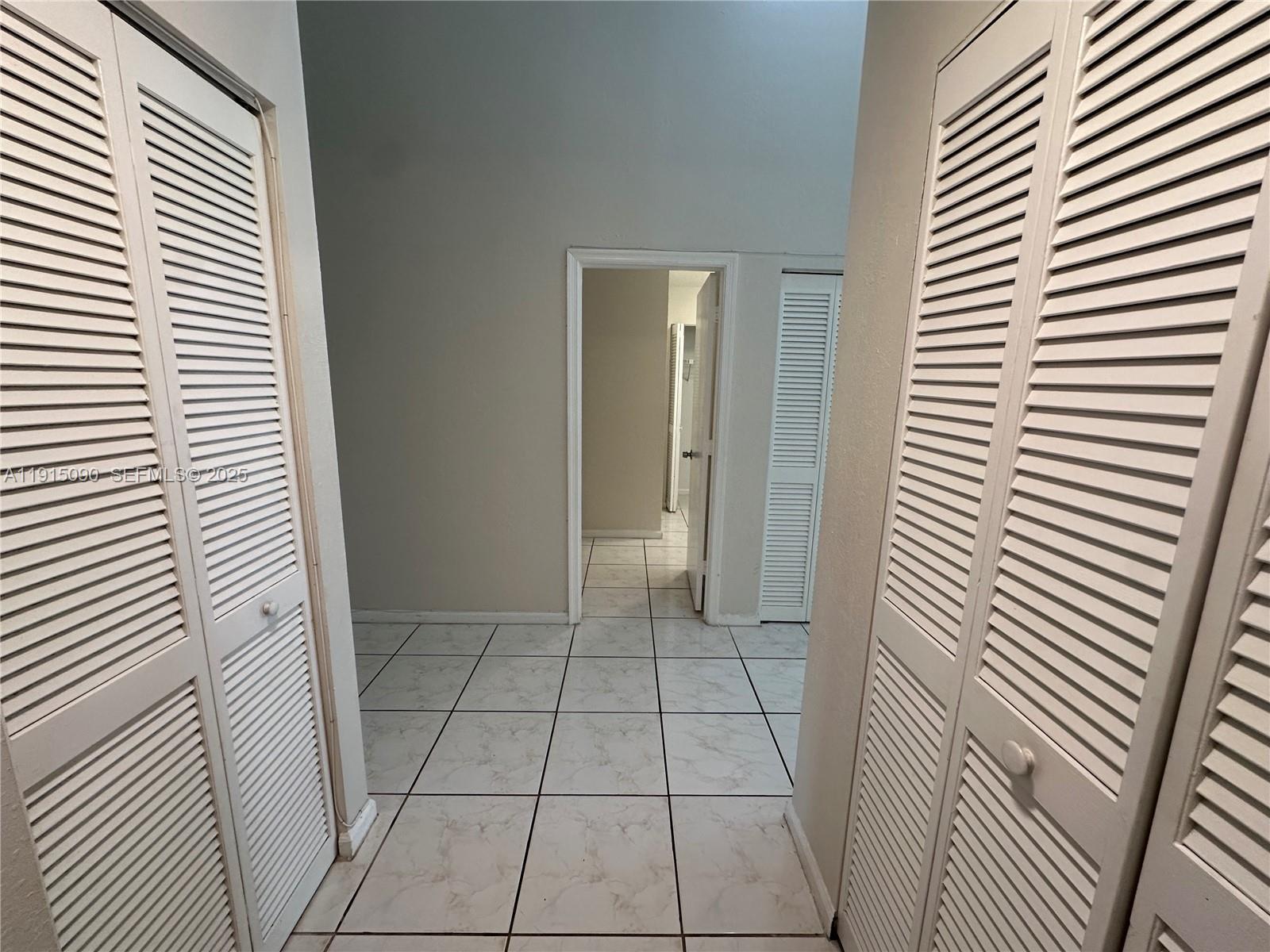 9336 Ketay Circle Boca Raton, FL 33428 - Photo 34 of 48 a view of an empty room with a window