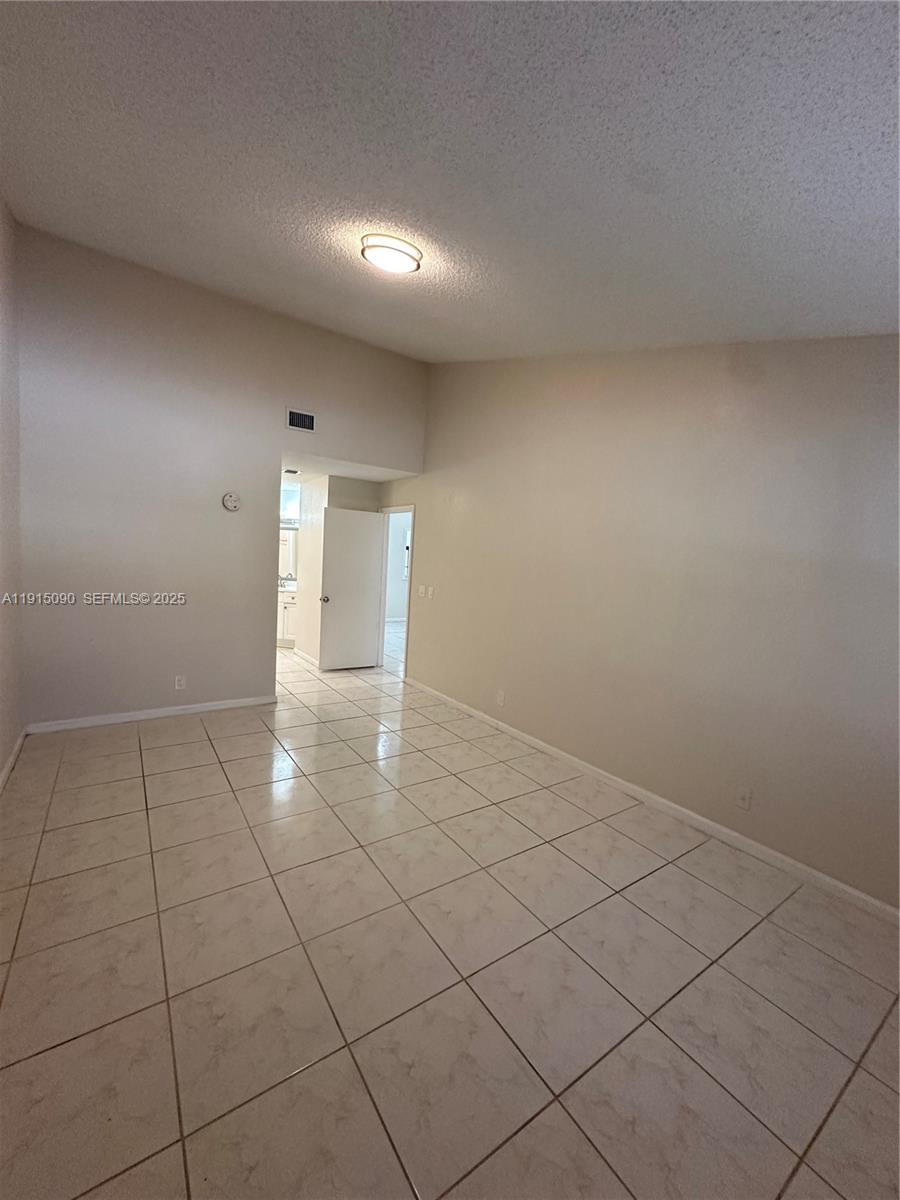 9336 Ketay Circle Boca Raton, FL 33428 - Photo 42 of 48 a view of an empty room and window
