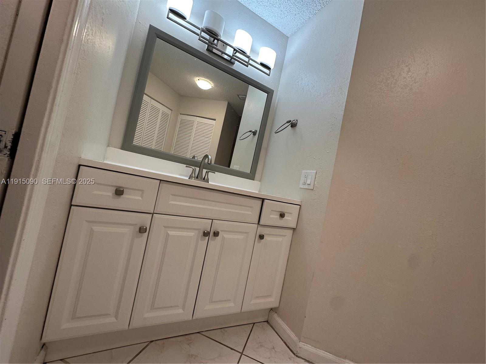 9336 Ketay Circle Boca Raton, FL 33428 - Photo 45 of 48 a view of a mirror on the door