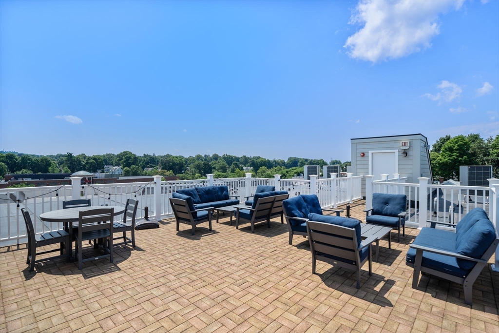 1789 Centre Street, Unit 401 Boston, MA 02132 - Photo 22 of 30 a terrace view with sitting space
