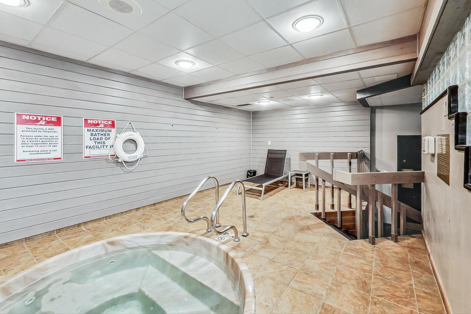 10 East Ontario Street, Unit 1205 Chicago, IL 60611 - Photo 26 of 30 a view of a room with gym equipment