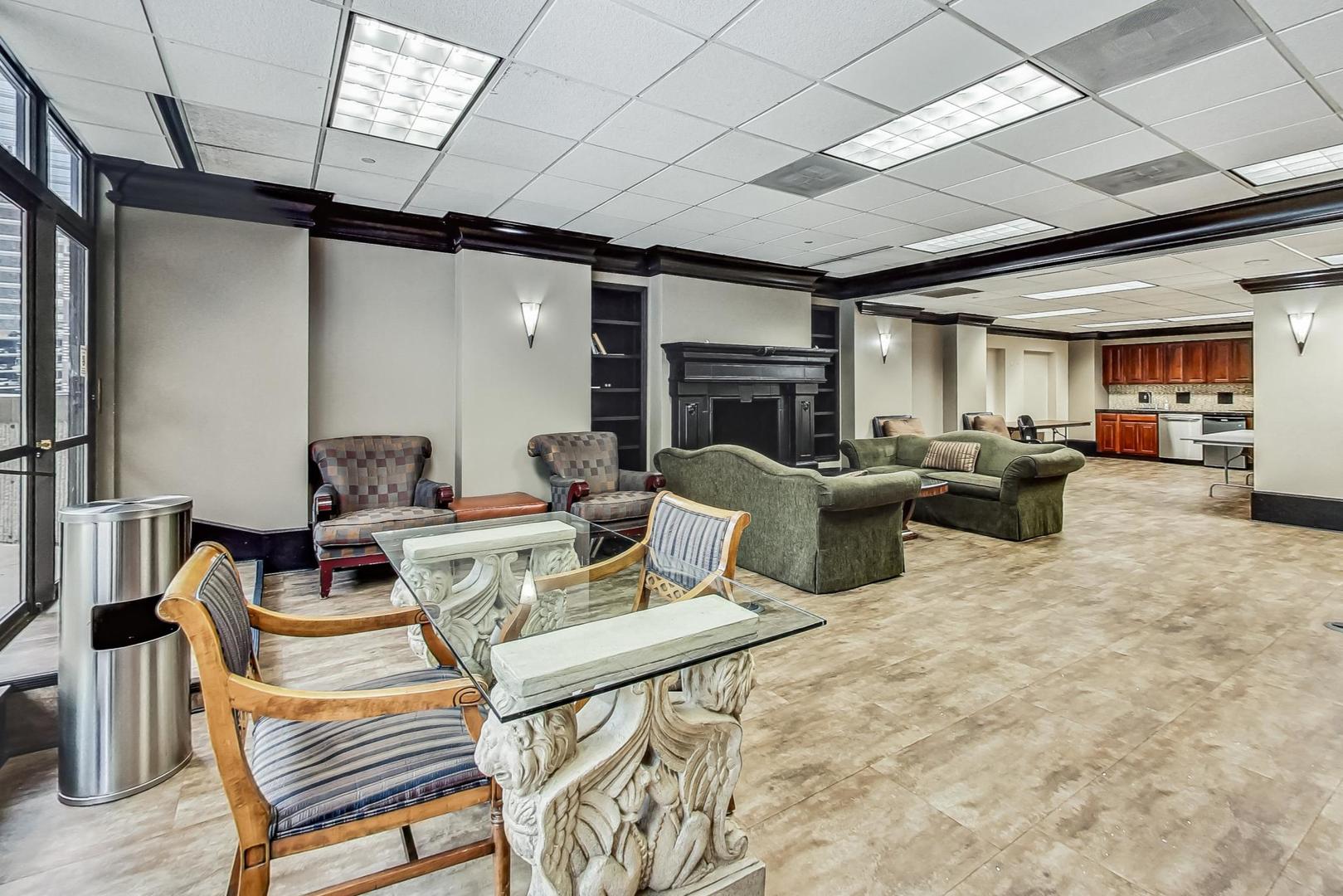 10 East Ontario Street, Unit 1205 Chicago, IL 60611 - Photo 29 of 30 a work room with furniture and a rug