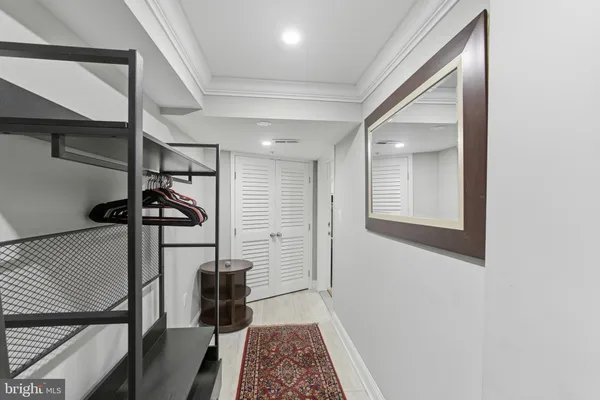 a view of a hallway with a potted plant