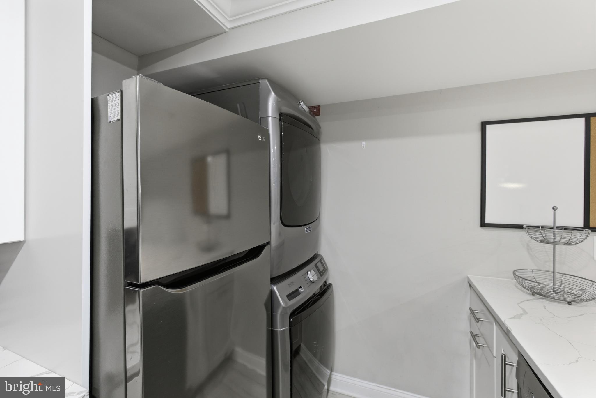 1748 S Street Northwest, Unit 2 Washington, DC 20009 - Photo 21 of 33 a bathroom with a sink and mirror